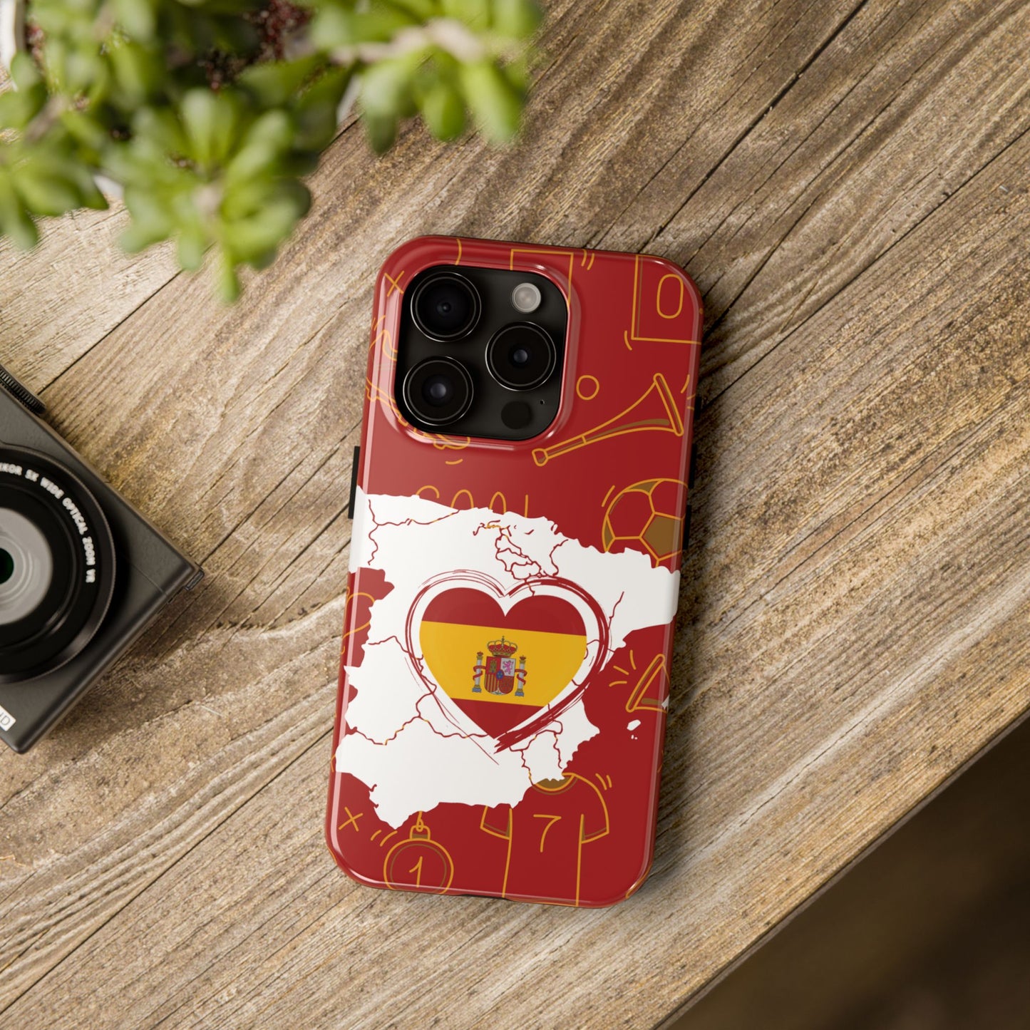 Tough phone case with crimson background, soccer icons, and white Spain map with heart-shaped Spanish flag at center