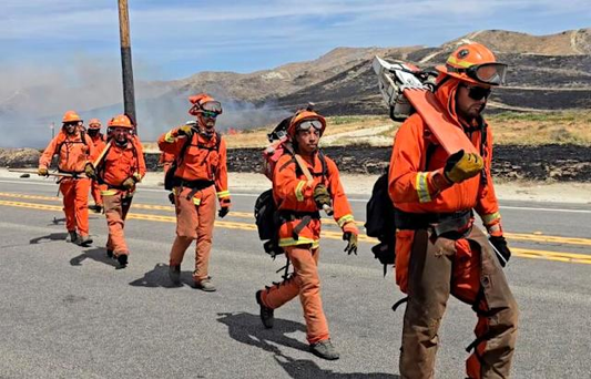 Wind-driven Springs Fire prompts widespread evacuations